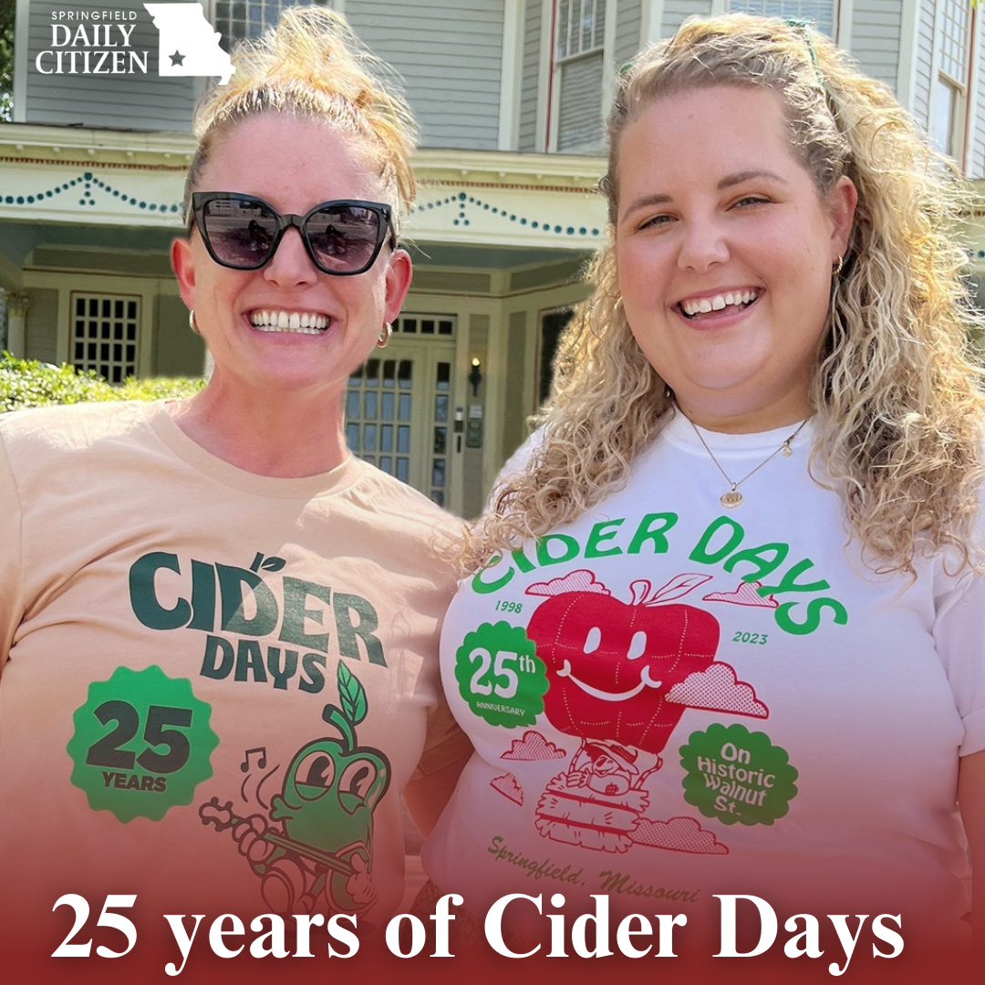 Two women modeling Cider Days on Historic Walnut Street T-shirts