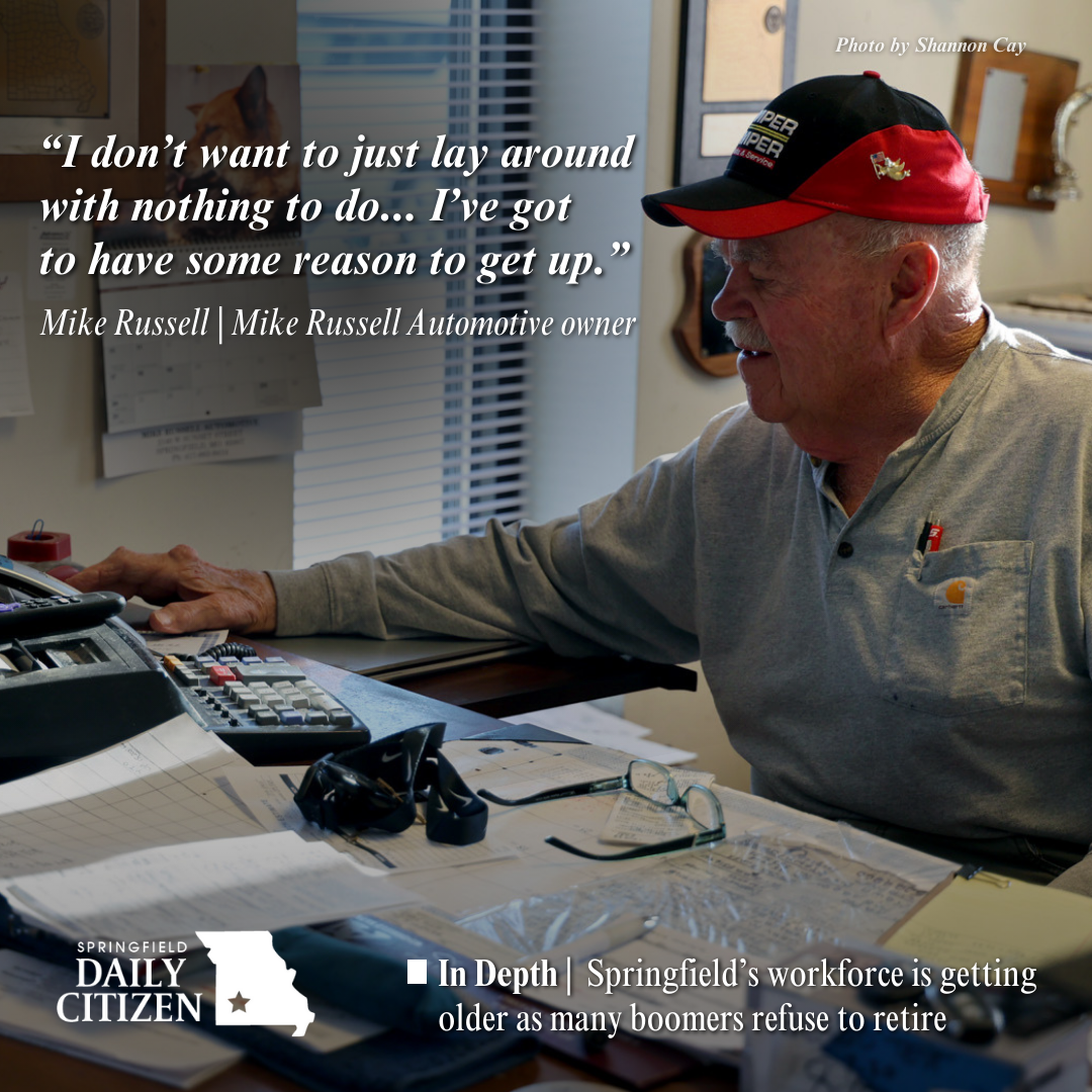 Mike Russell, 83, works at his desk at his namesake automotive shop in Springfield, Missouri. Text on the image reads: "I don't want to just lay around with nothing to do... I've got to have some reason to get up." Mike Russell | Mike Russell Automotive owner  (Photo by Shannon Cay) 