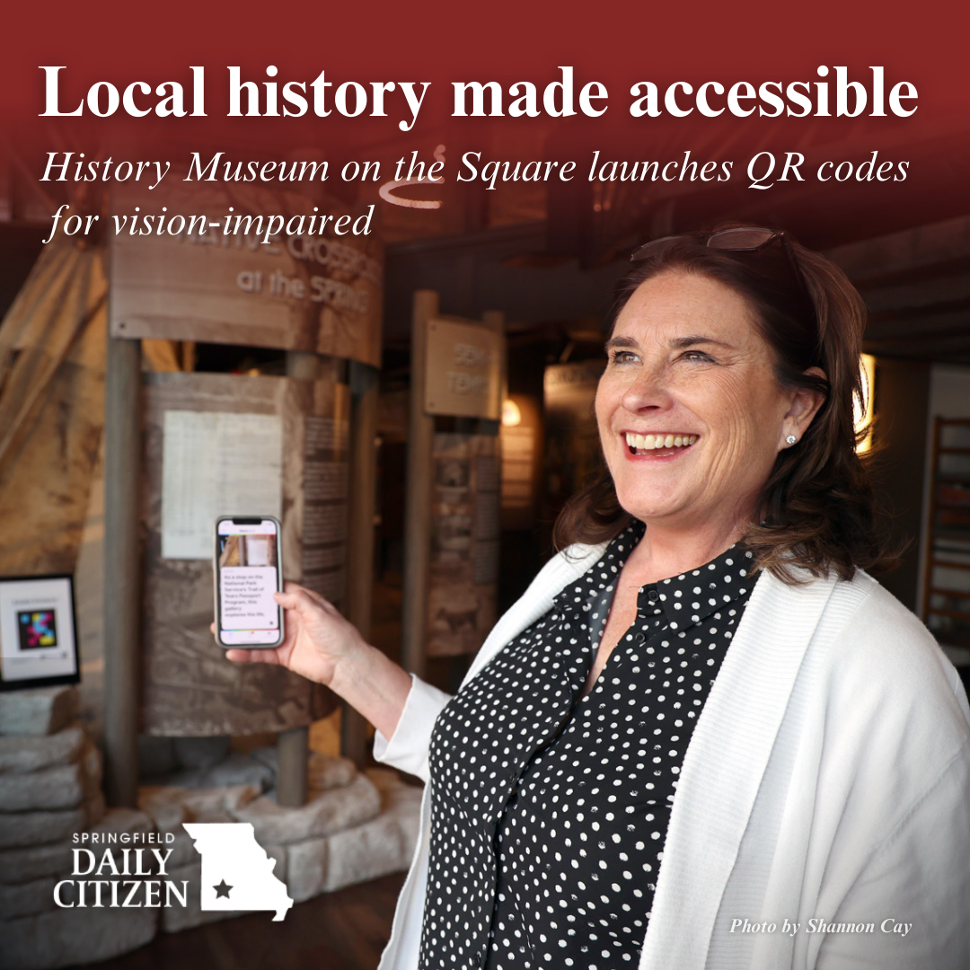Charlotte McCoy, Business Manager for the History Museum on The Square, demonstrates how NaviLens helps persons with vision impairments. Text on the image reads, "Local history made accessible. History Museum on the Square launches QR codes for vision-impaired." (Photo by Shannon Cay) 