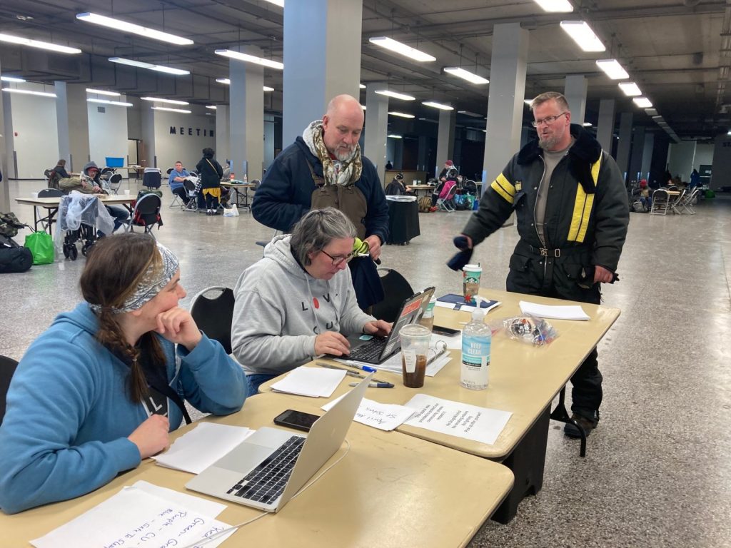 Volunteers at the emergency warming shelter at the Springfield Expo Center