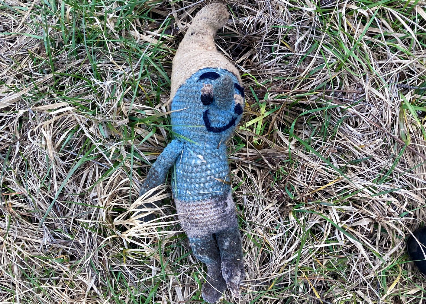A toy lies on the ground at a large homeless camp in northeast Springfield.
