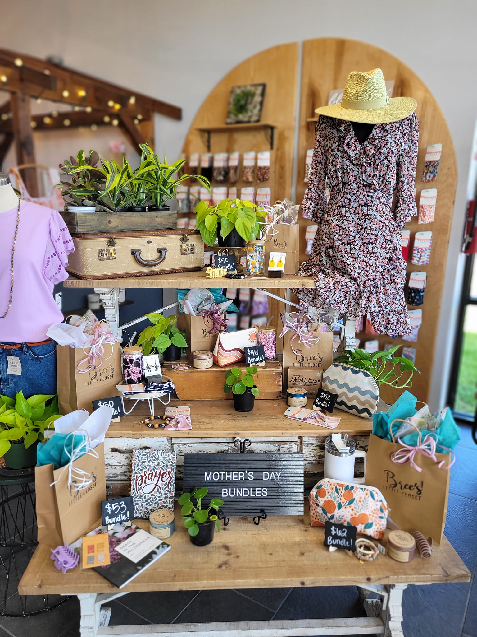 A display of Mother's Day gift bundles inside a boutique store