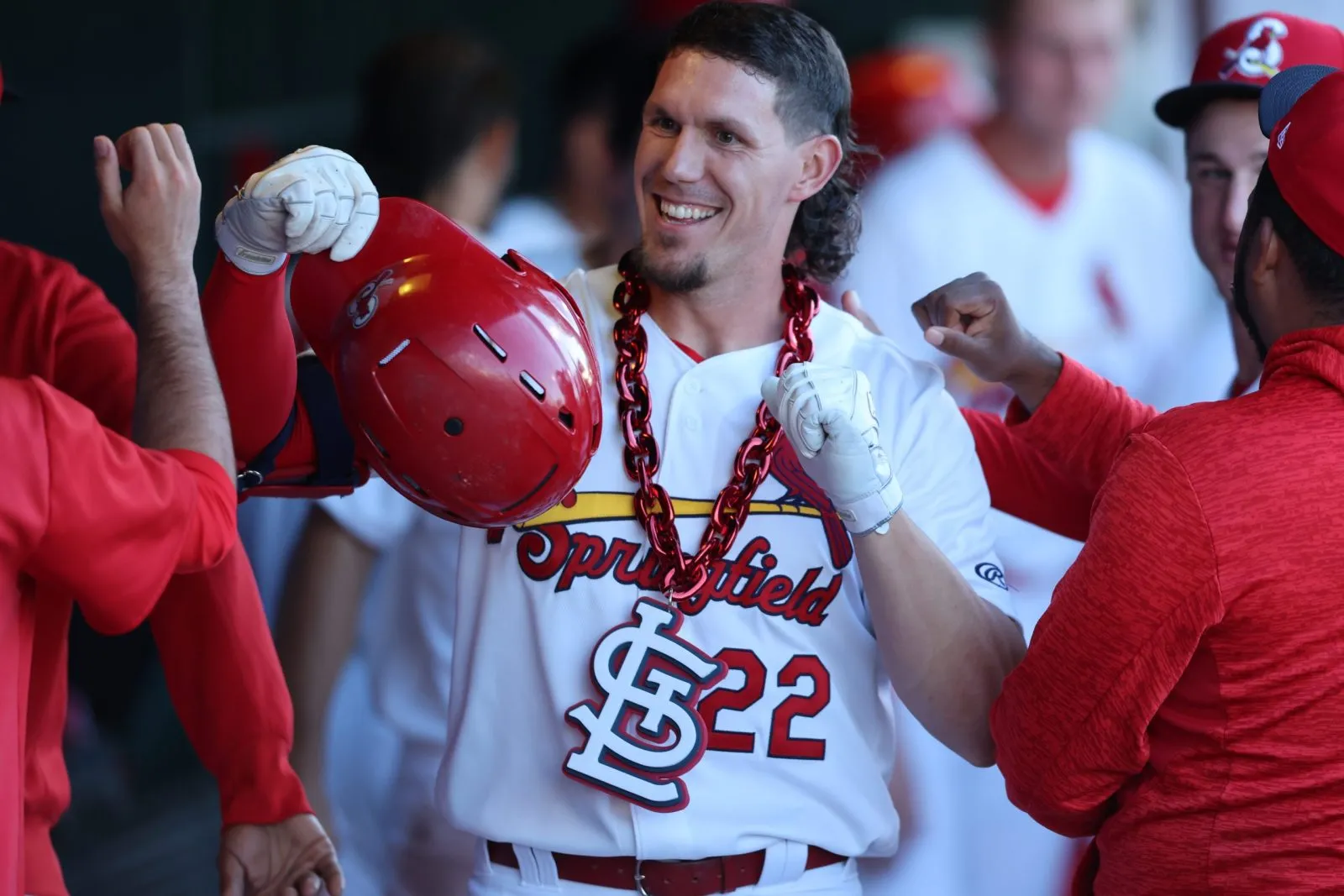 A baseball player in a Springfield Cardinals uniform celebrates after hitting a home run