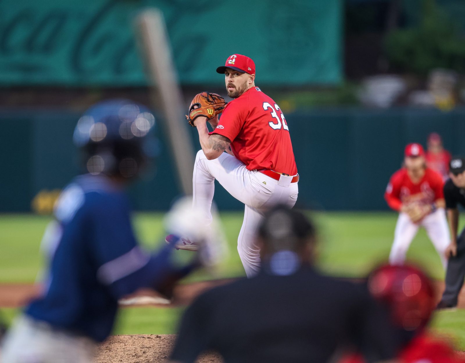 Logan Sawyer, wearing a Springfield Cardinals uniform, pitches the baseball