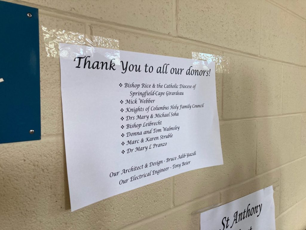 Sacred Heart Catholic Church's Father Ray Smith made this sign to thank those who donated money and their talents to the bathroom project
