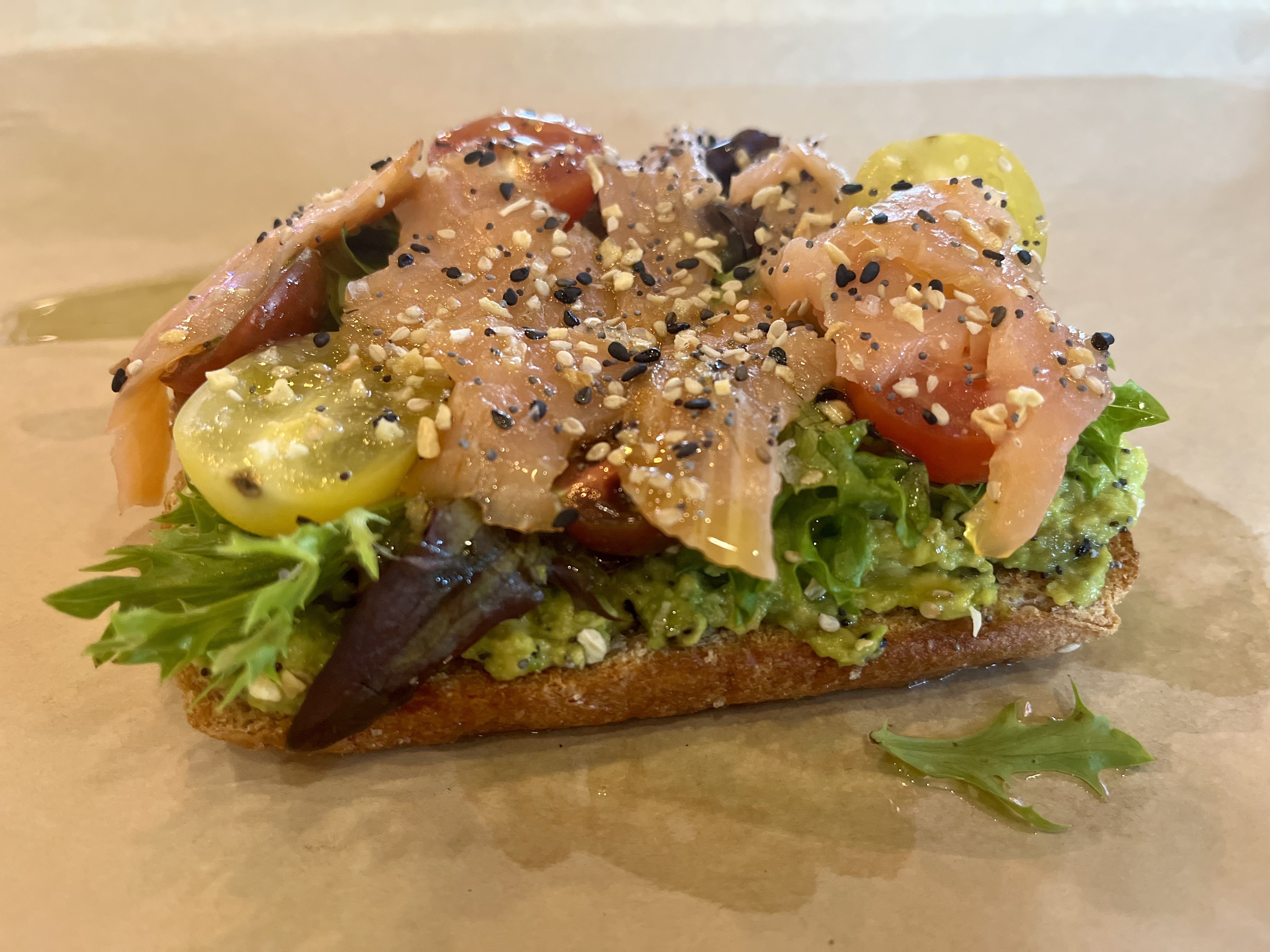 A slice of avocado toast from Lindsay's Kitchen at 14 Mill Market