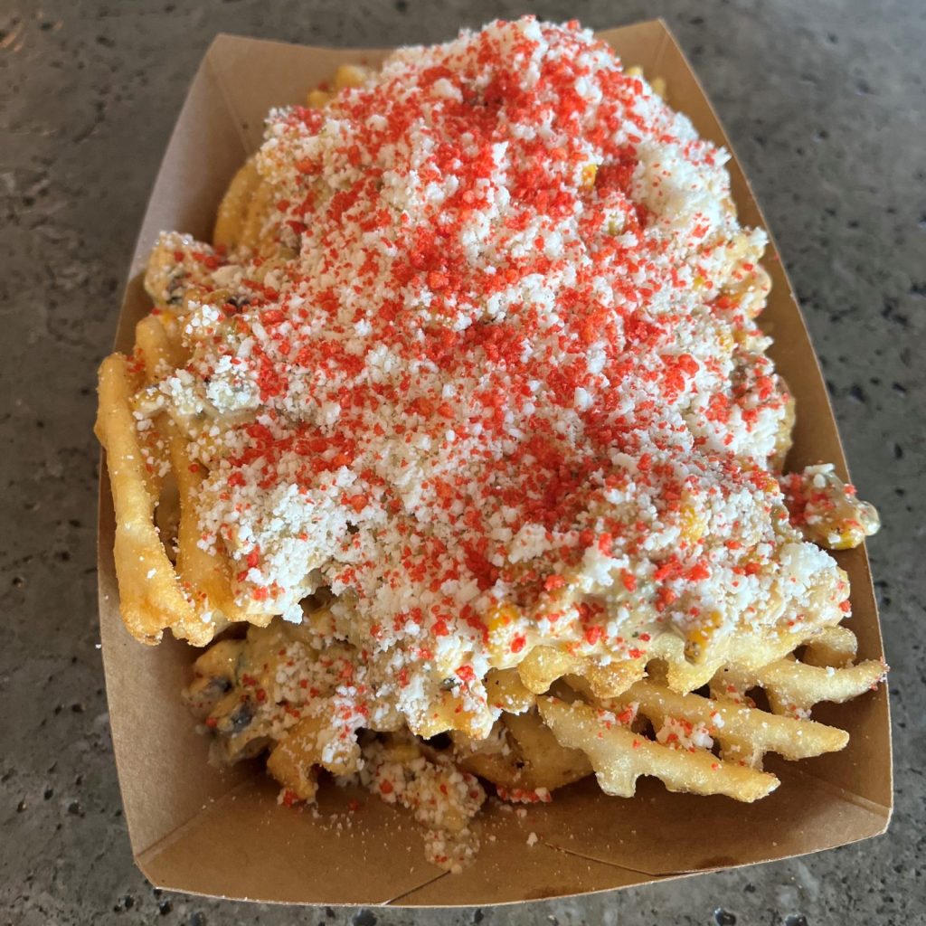 A dish of Elote Loaded Fries from MO Slider Company
