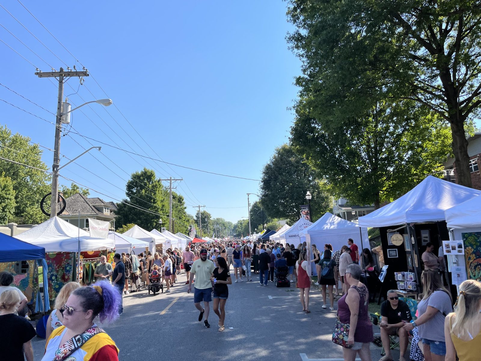 Crowds browse tents along Historic Walnut Street during Cider Days