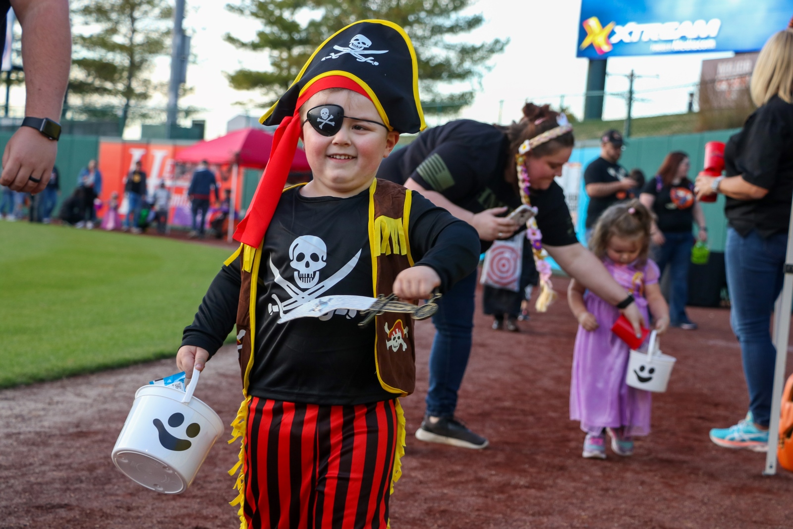 A young boy in a pirate costume