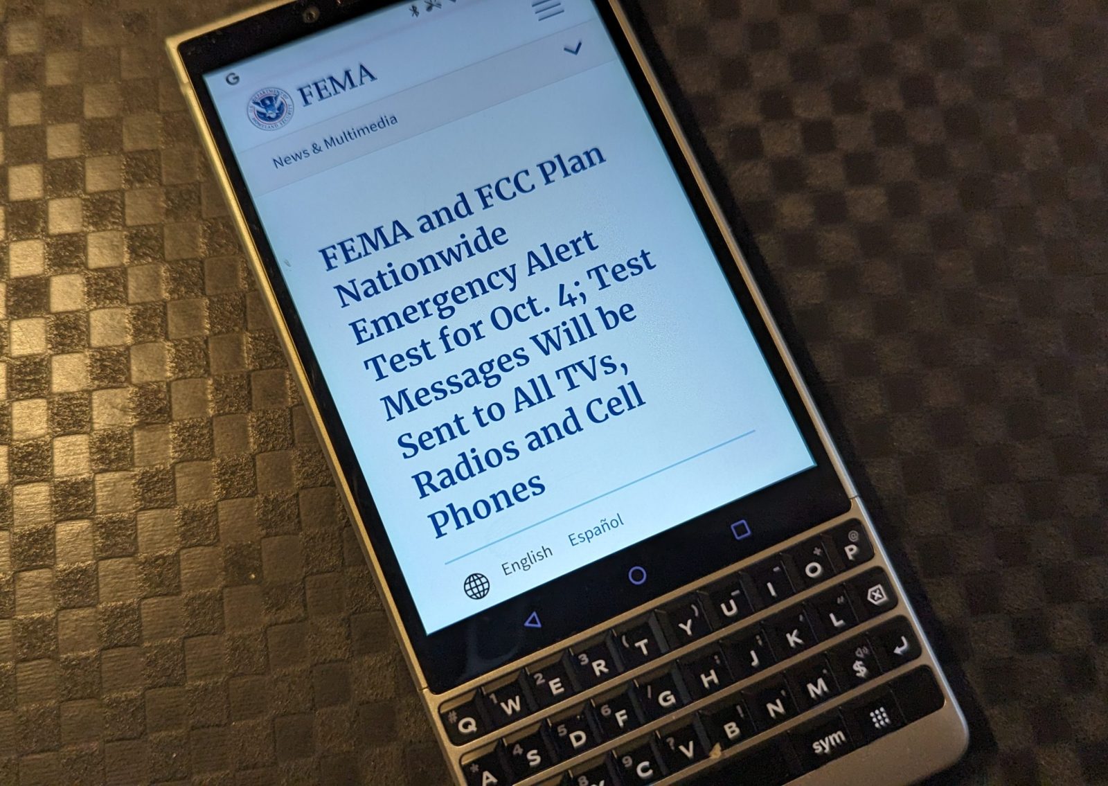 Emergency alert displayed on a cellphone screen.