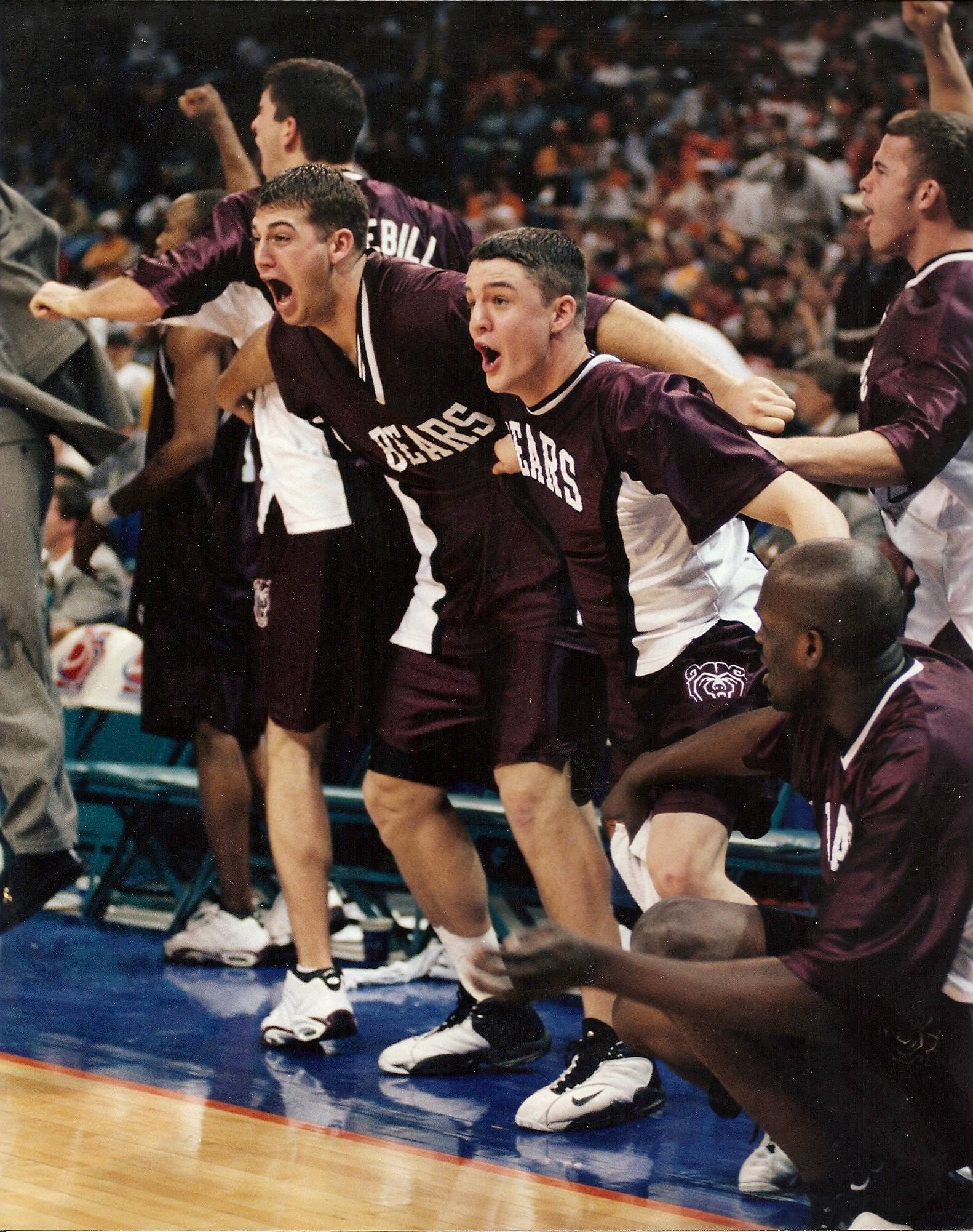 The Missouri State Bears celebrate on the bench during an NCAA Tournament win in 1999