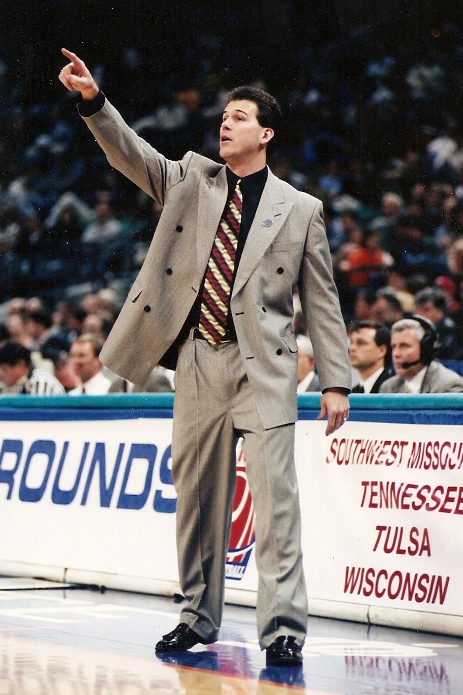 Steve Alford shouts instructions to his team during a basketball game
