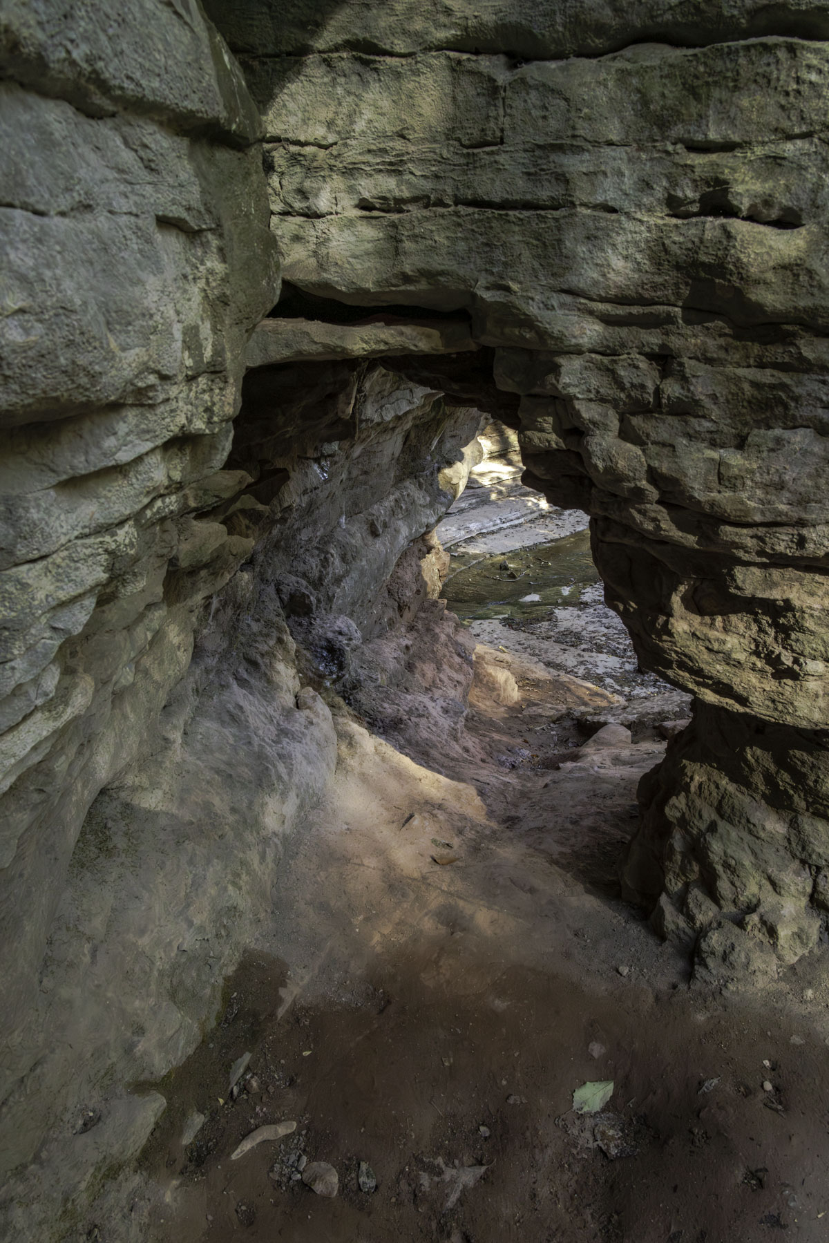 Fissures, caves and crevices pockmark the Natural Bridge on the Lost Valley Trail in Arkansas.
