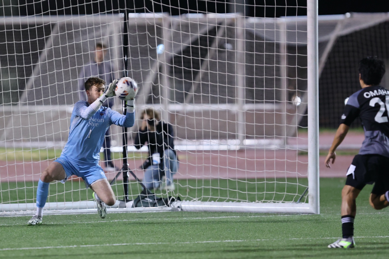 Missouri State Bears soccer goalie Harry Townsend makes a save during a game