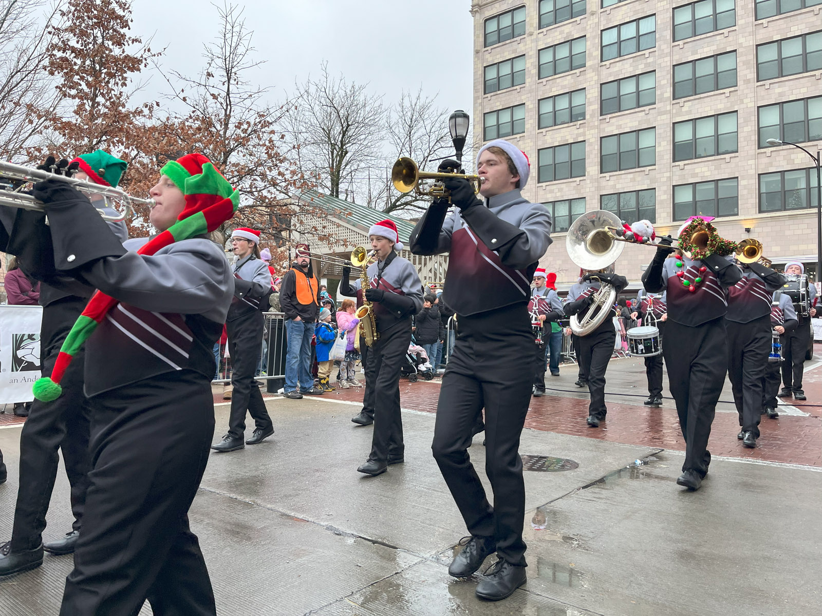 A marching band participates in the Downtown Springfield Christmas Parade