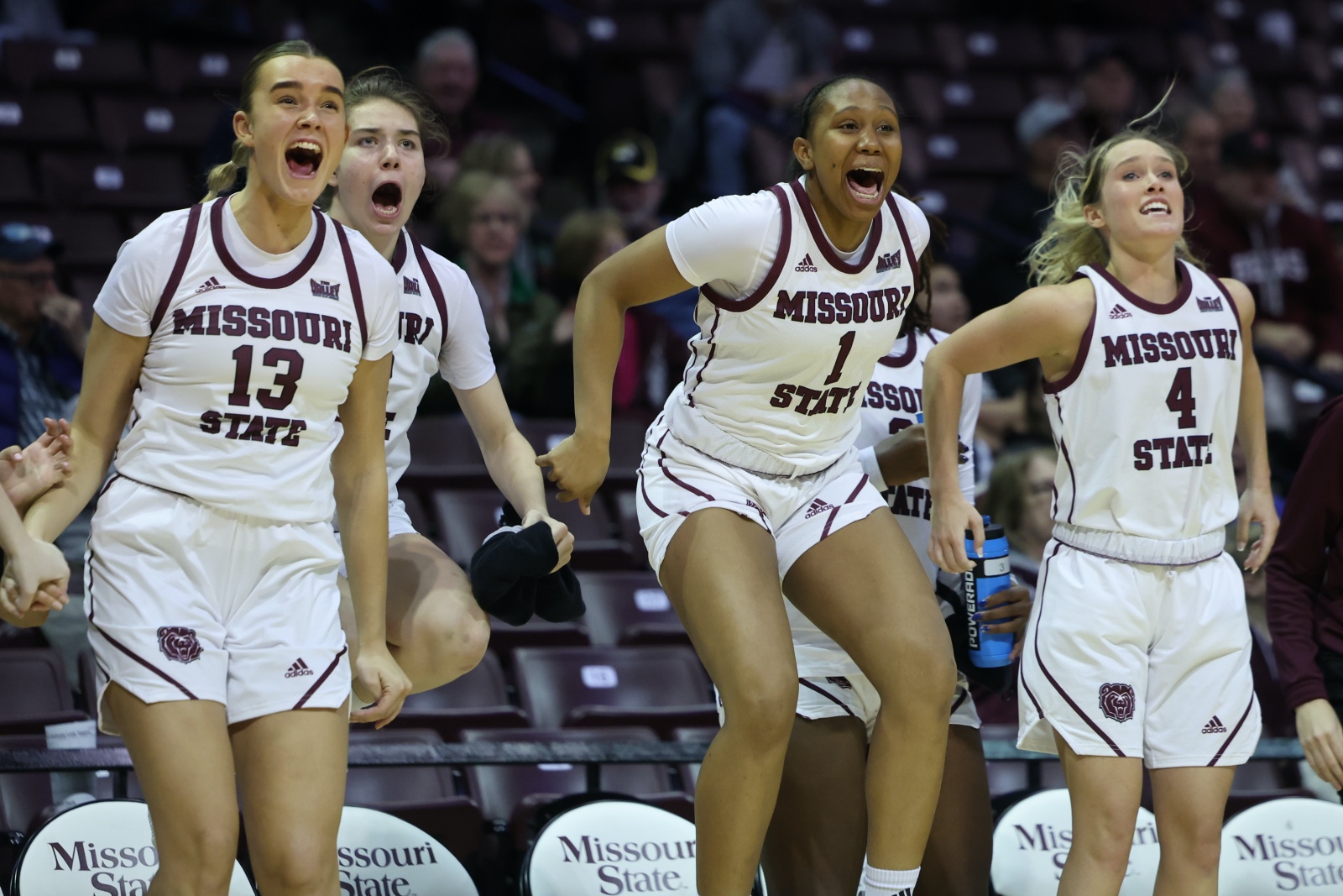 Players on the Missouri State Lady Bears' bench celebrate during a win over BYU.