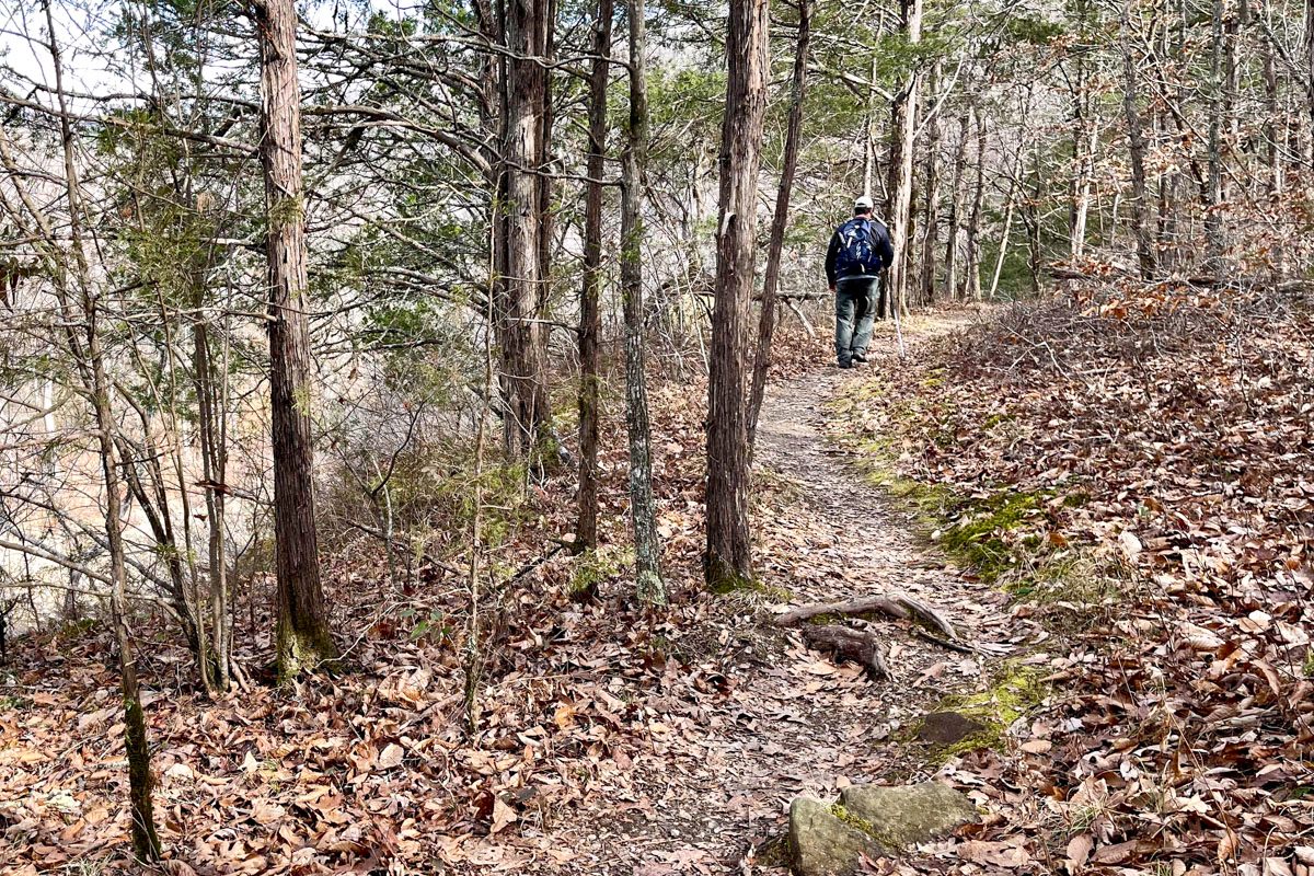 A hiker treks part of the Buffalo River Trail between Ponca and Steel Creek on a winter day. (Photo by Sony Hocklander)