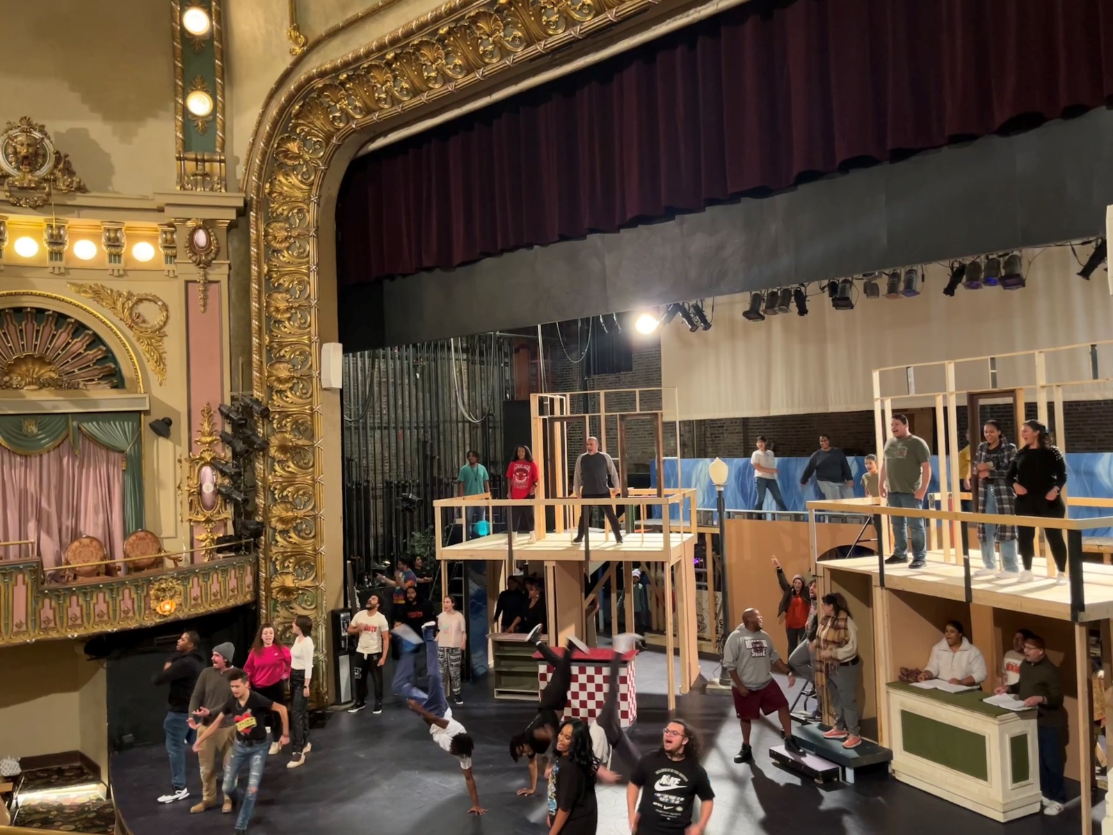 The cast of "In the Heights" rehearses on the Landers Theatre stage