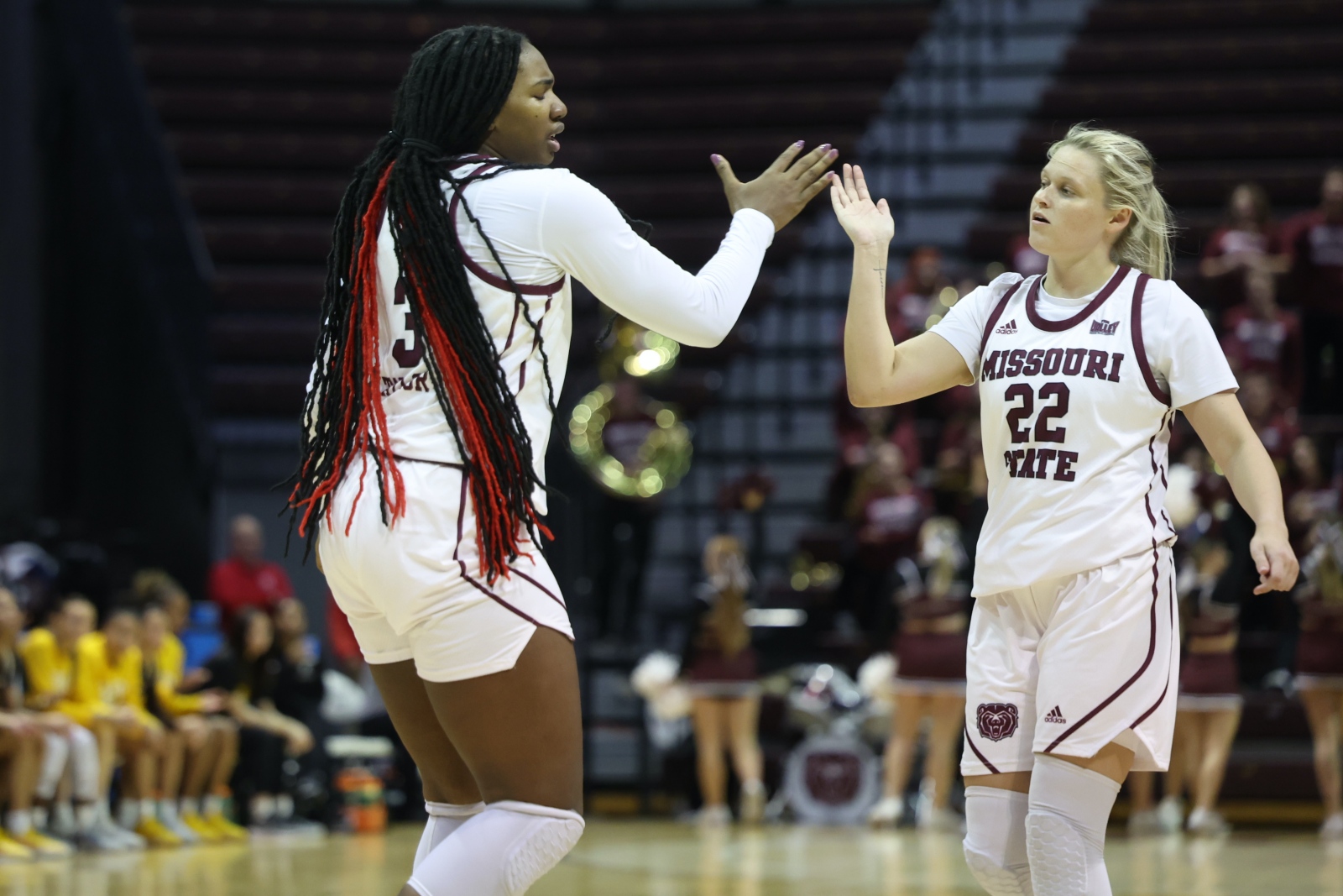 Kennedy Taylor, left, and Paige Rocca celebrate Rocca’s first-half 3-pointer in Missouri State’s victory Thursday night over Valparaiso at Great Southern Bank Arena.