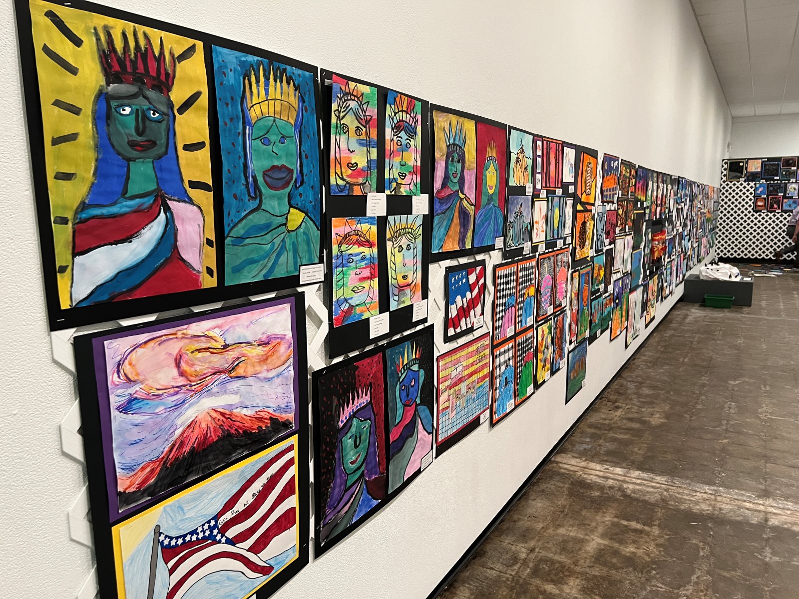 Artwork by children hangs on the walls of the Springfield Art Museum