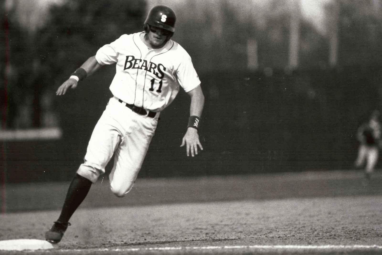 Jason Hart, wearing a Missouri State Bears baseball uniform, rounds the bases during a game