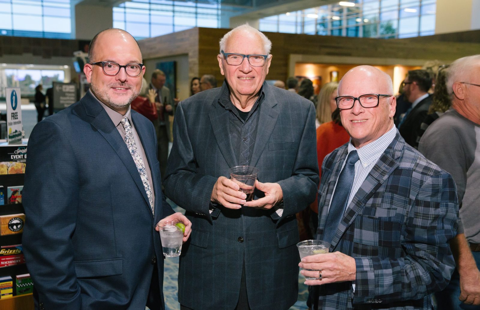 Robert Bradley, middle, poses for a photo with Rick Dines and Bradley's partner Lou Schaeffer at the 2019 Ozzies.