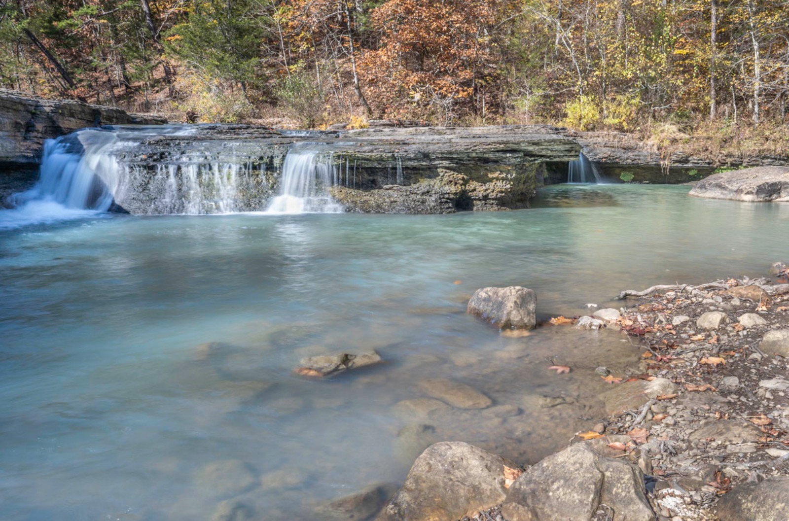 Haw Creek Falls, seen here in the drier fall season, is a great place to have a picnic and let kids splash around the creek. (Photo by Sony Hocklander)