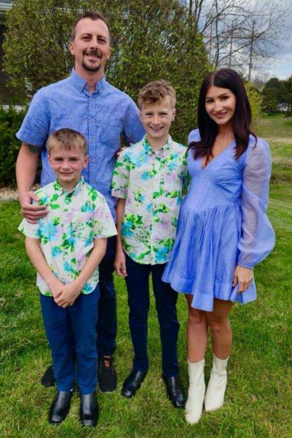 Chris Evans and his wife Katya pose for a picture with their two sons, ages 13 and 9
