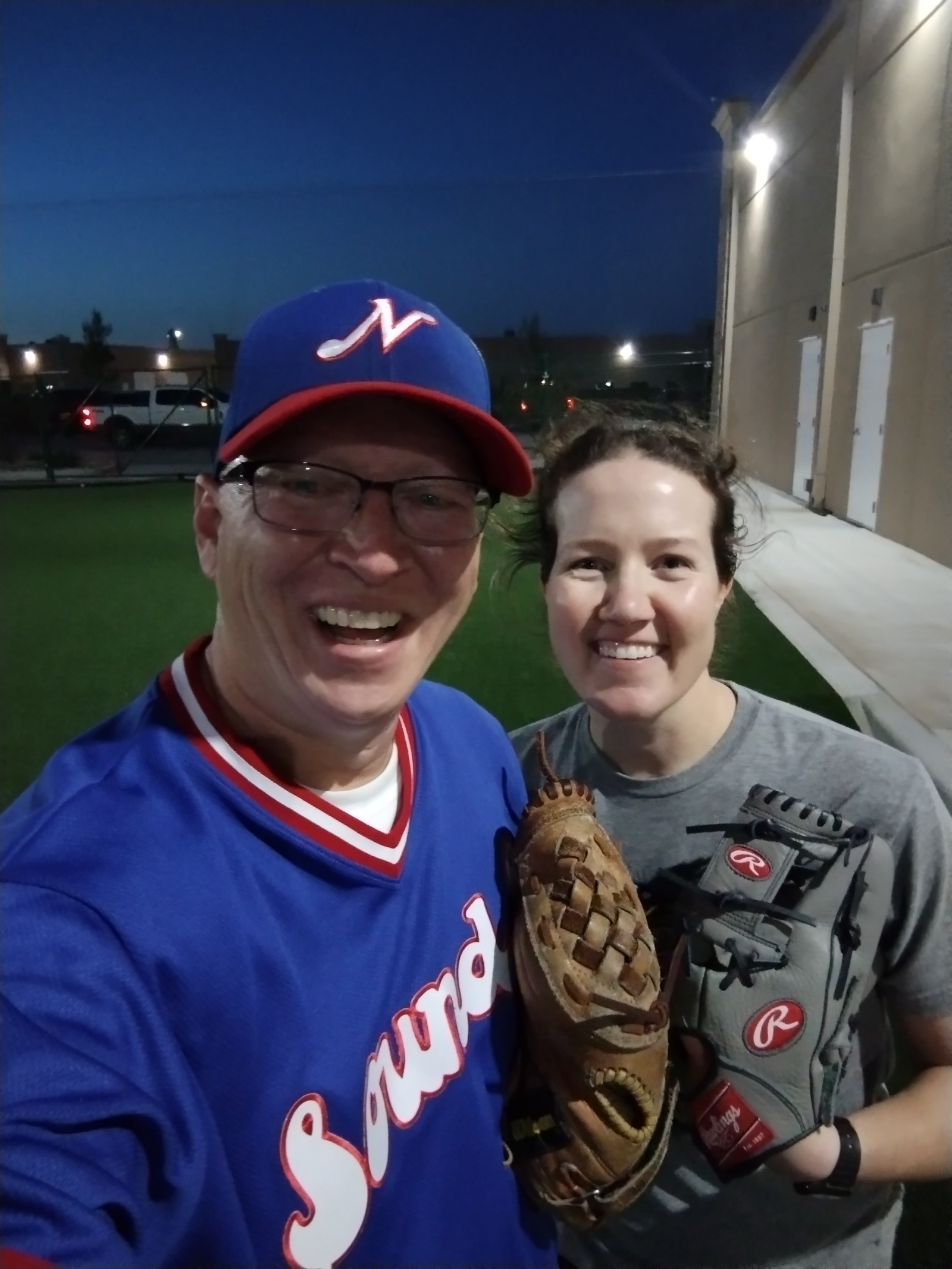 Author Ethan Bryan, left, and Anna Di Tommaso pose for a selfie after a game of catch.