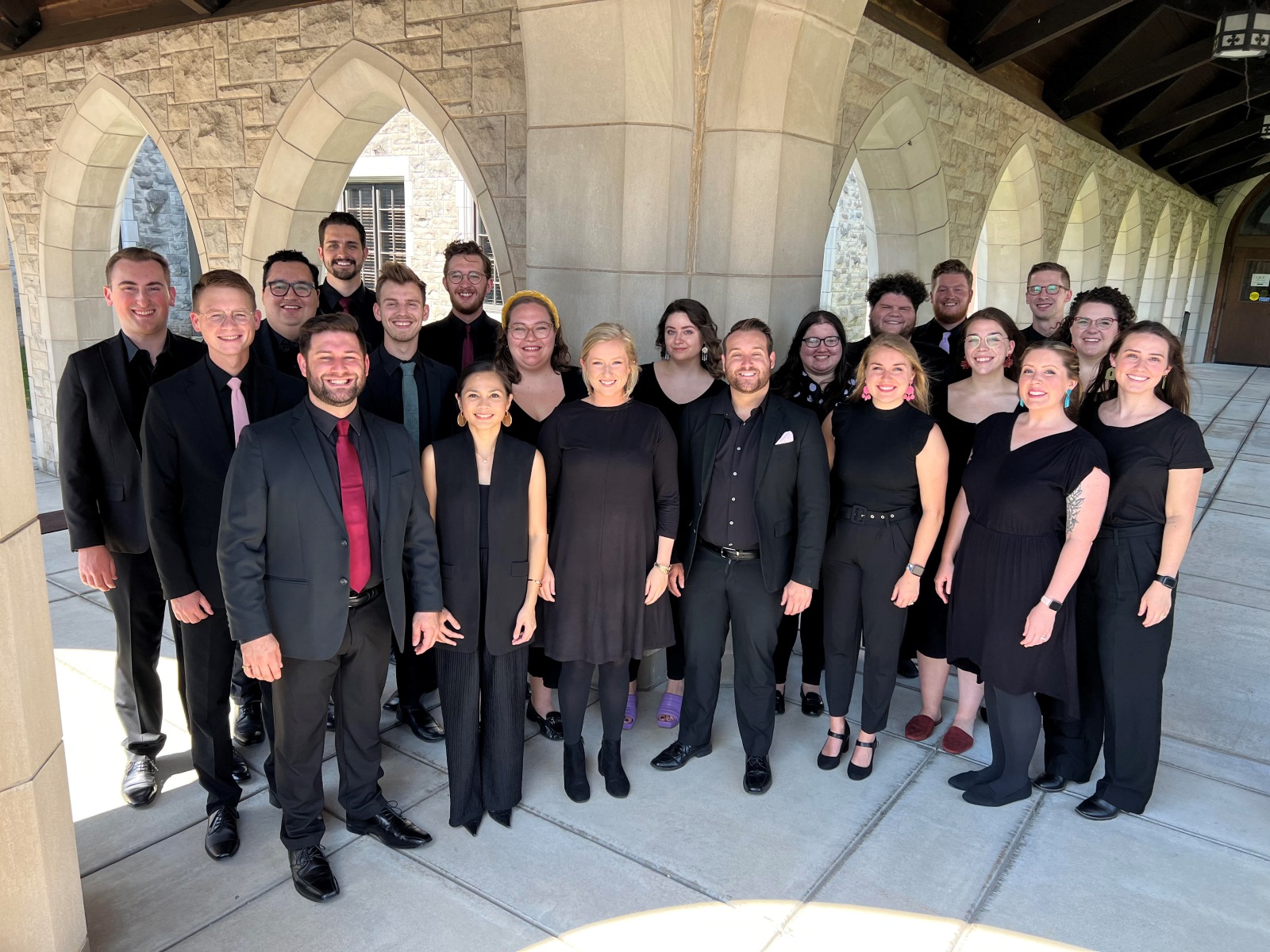 Members of Queen City Chorale pose for a photo outside Christ Episcopal Church in Springfield, Missouri
