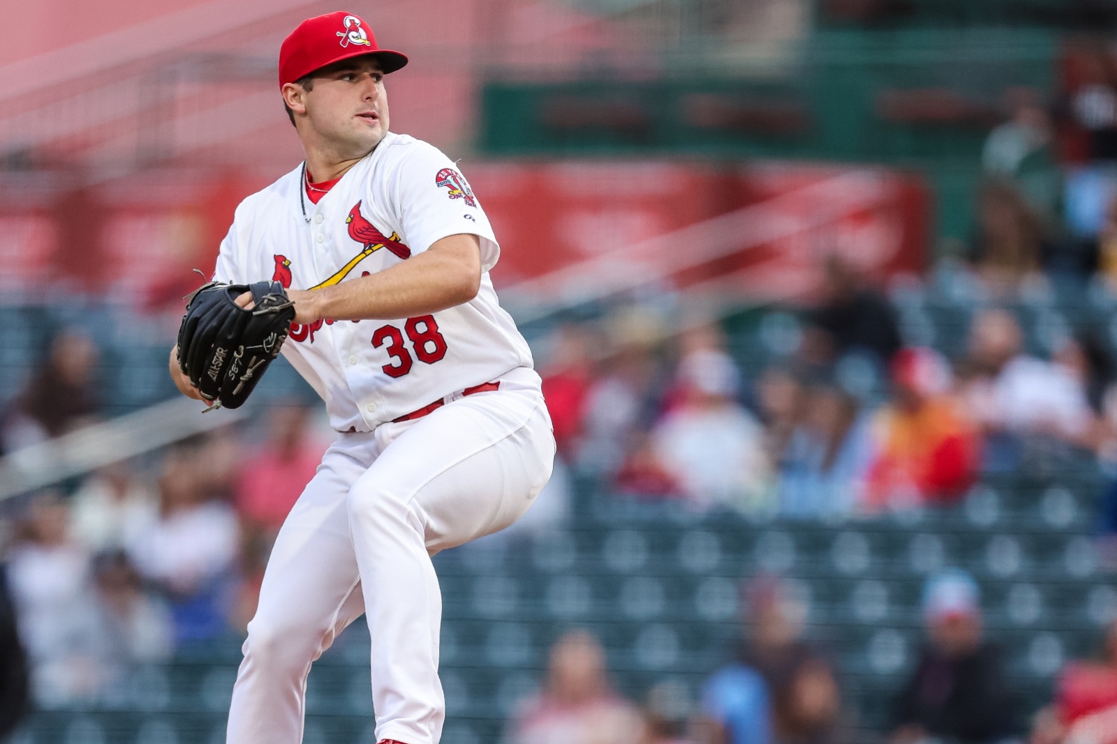 Max Rajcic, wearing a Springfield Cardinals uniform, pitches the baseball during a game at Hammons Field