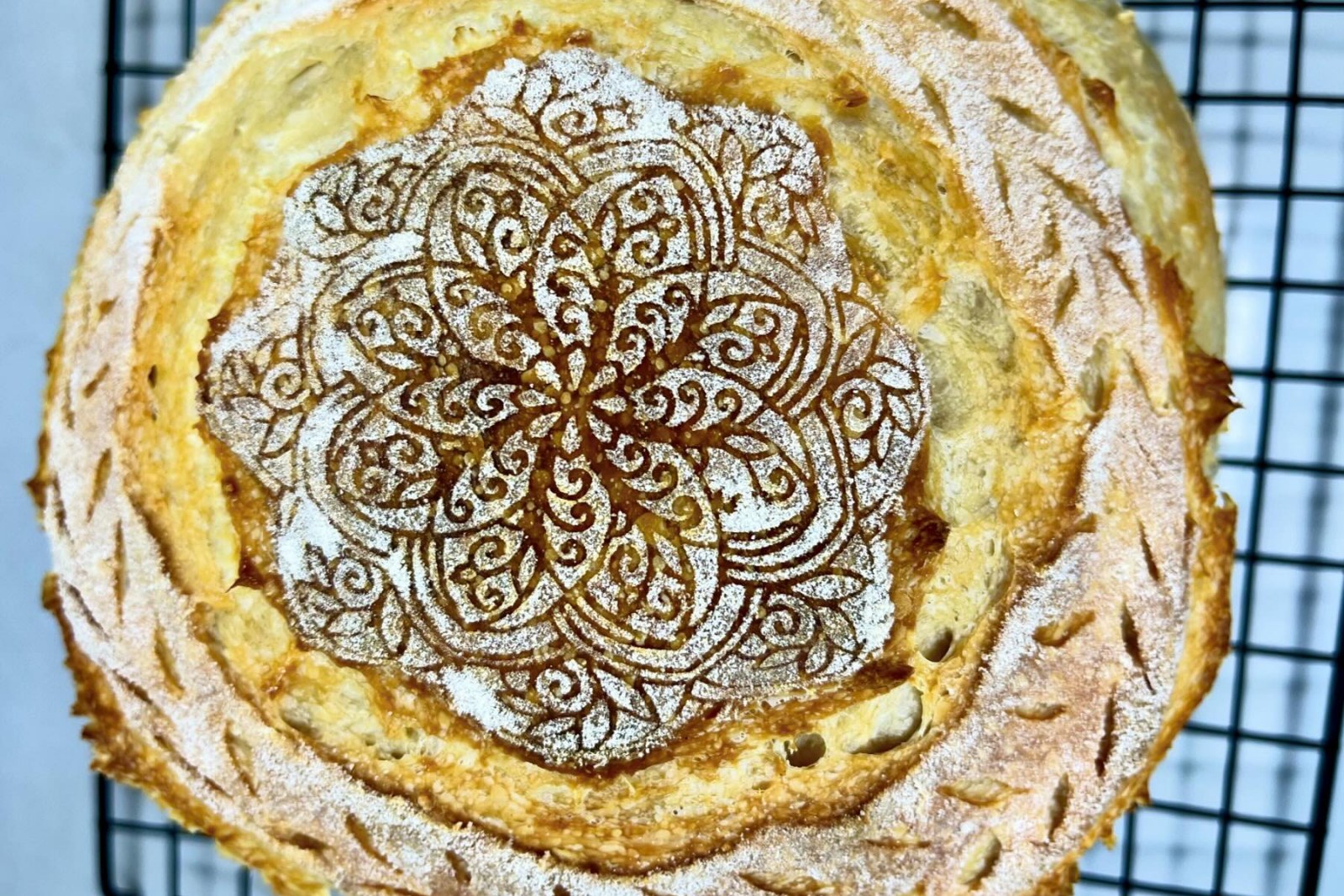 A decorative loaf of sourdough bread