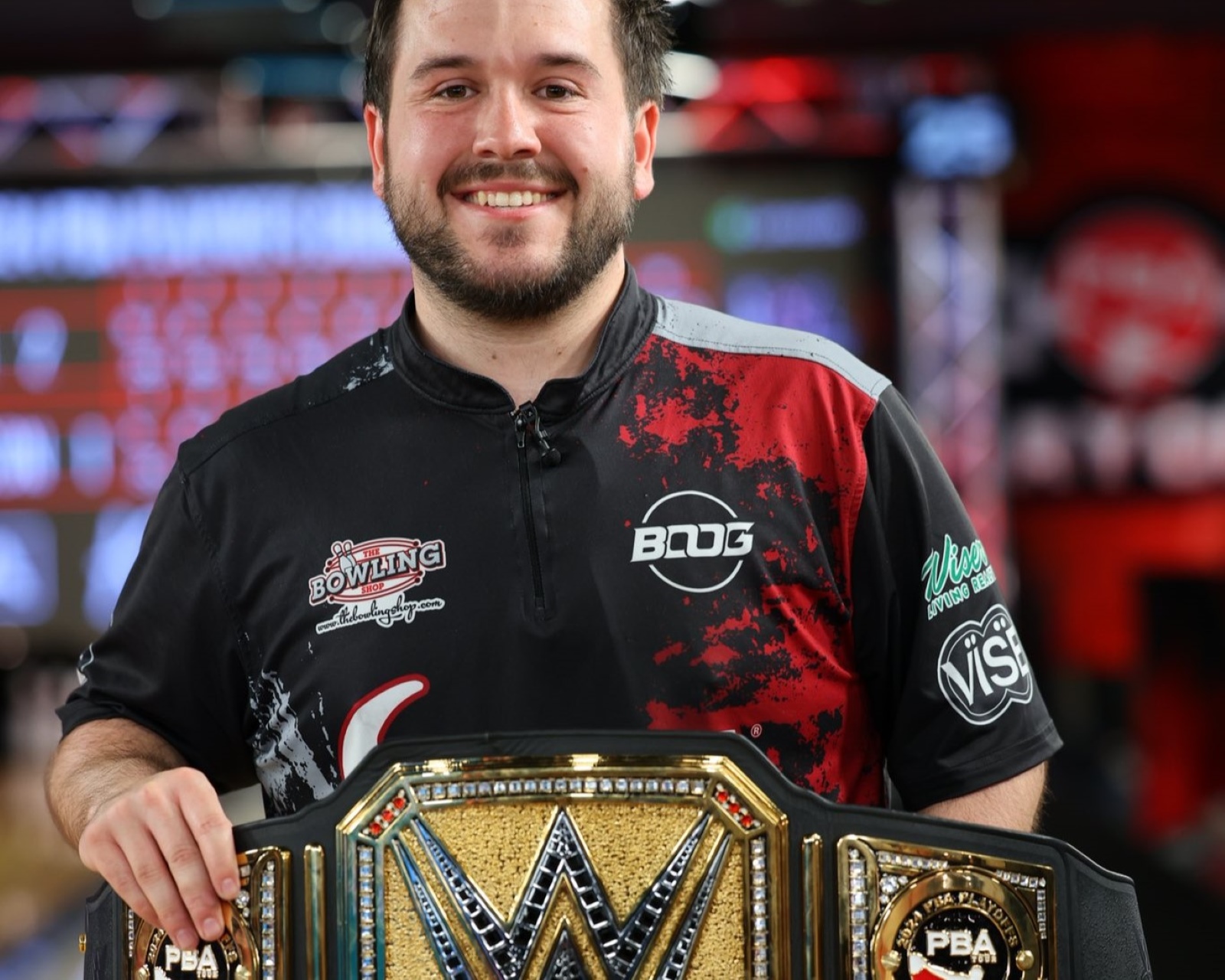 David “Boog” Krol holds the PBA Playoffs championship belt after his $75,000 victory on March 19 in Kissimmee, Florida. (Photo by PBA Tour)