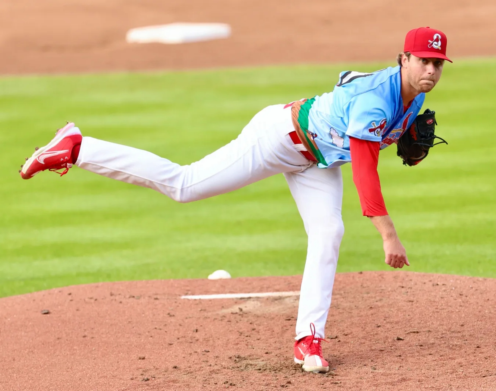 Kyle Leahy, wearing a Springfield Cardinals uniform, pitches the baseball during a game at Hammons Field in Springfield, Missouri.