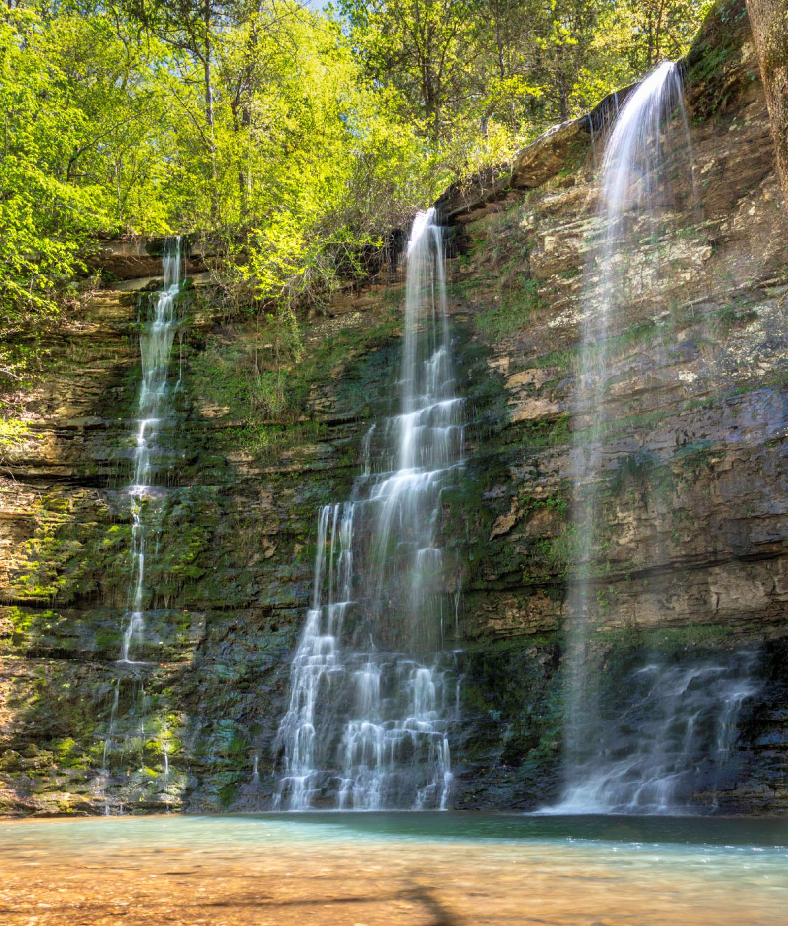 The trailhead sign says Twin Falls, but this waterfall near the Buffalo National River is generally a triple after good rains. (Photo by Sony Hocklander)