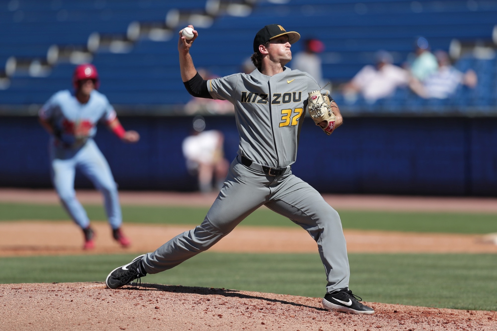 Ian Bedell, wearing a Mizzou Tigers uniform, pitches the baseball during a game.