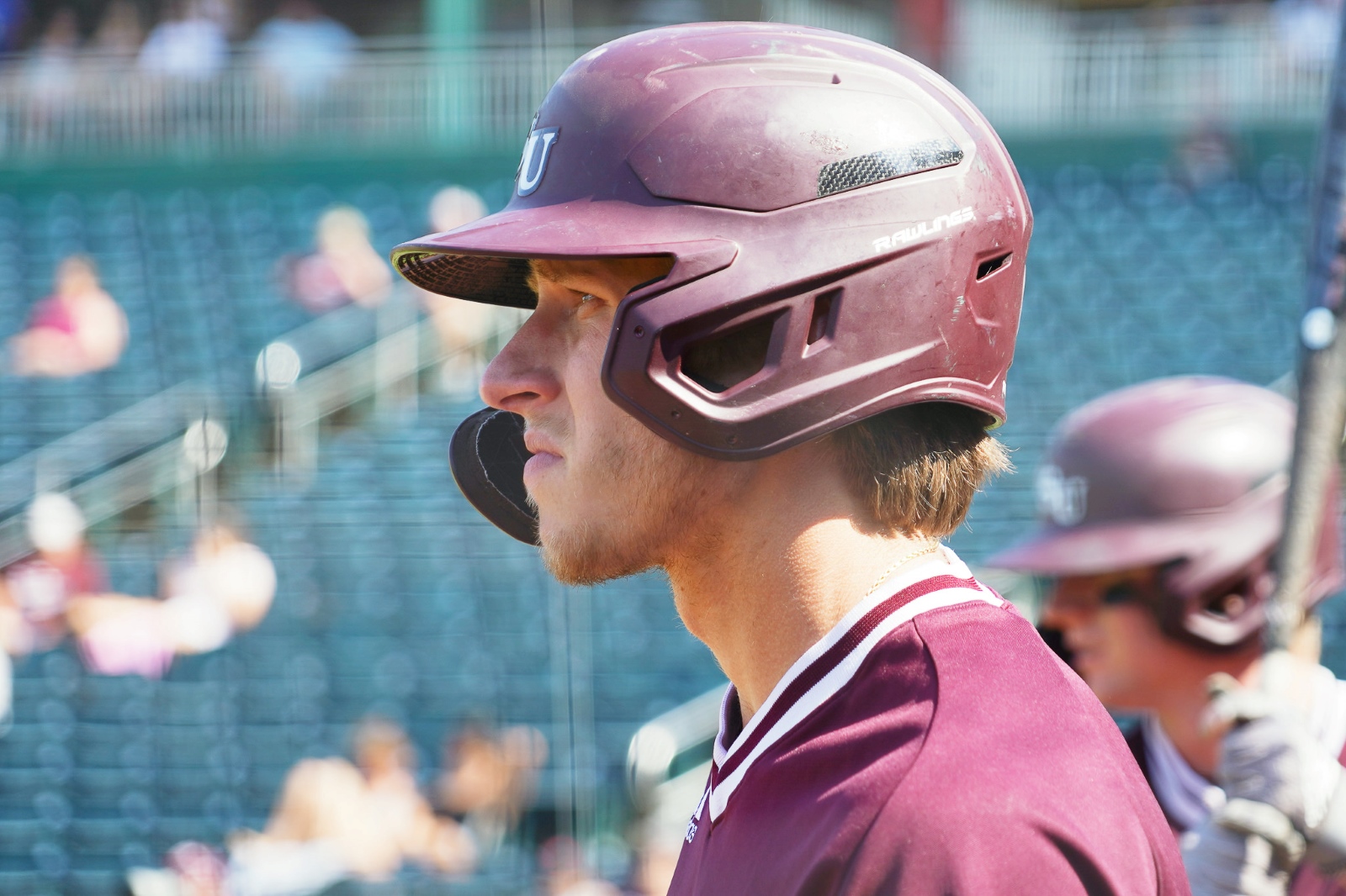 Spencer Nivens, wearing a Missouri State baseball uniform, waits in the on-deck circle during a game at Hammons Field in Springfield, Missouri.