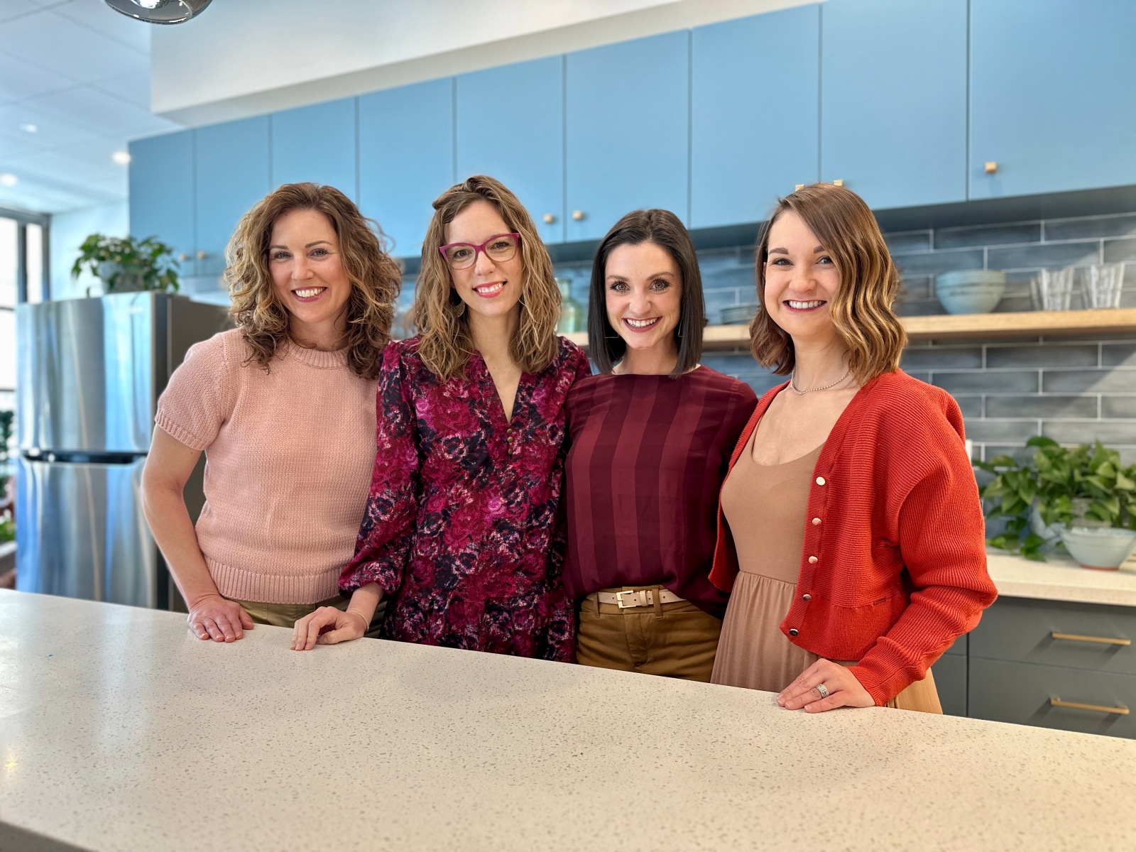 Four women pose for a photo inside the Nutrition Studio in Springfield.