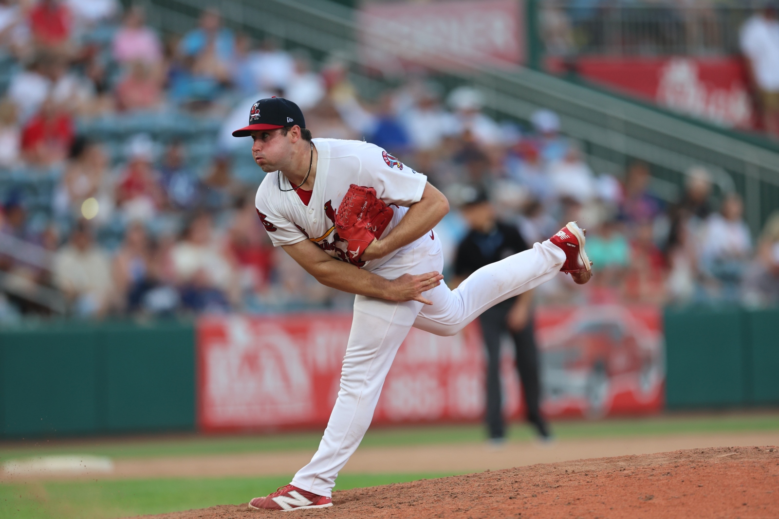 Max Rajcic, wearing a Springfield Cardinals uniform, pitches the baseball during a game at Hammons Field.