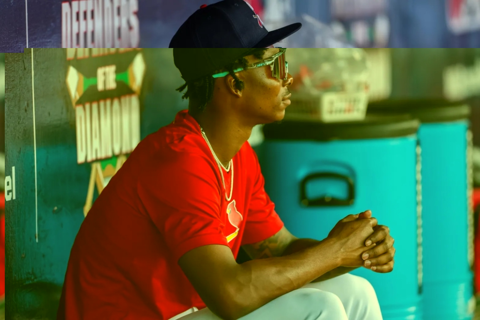 Springfield Cardinals pitcher Tink Hence sits in a dugout at Hammons Field in Springfield, Missouri.